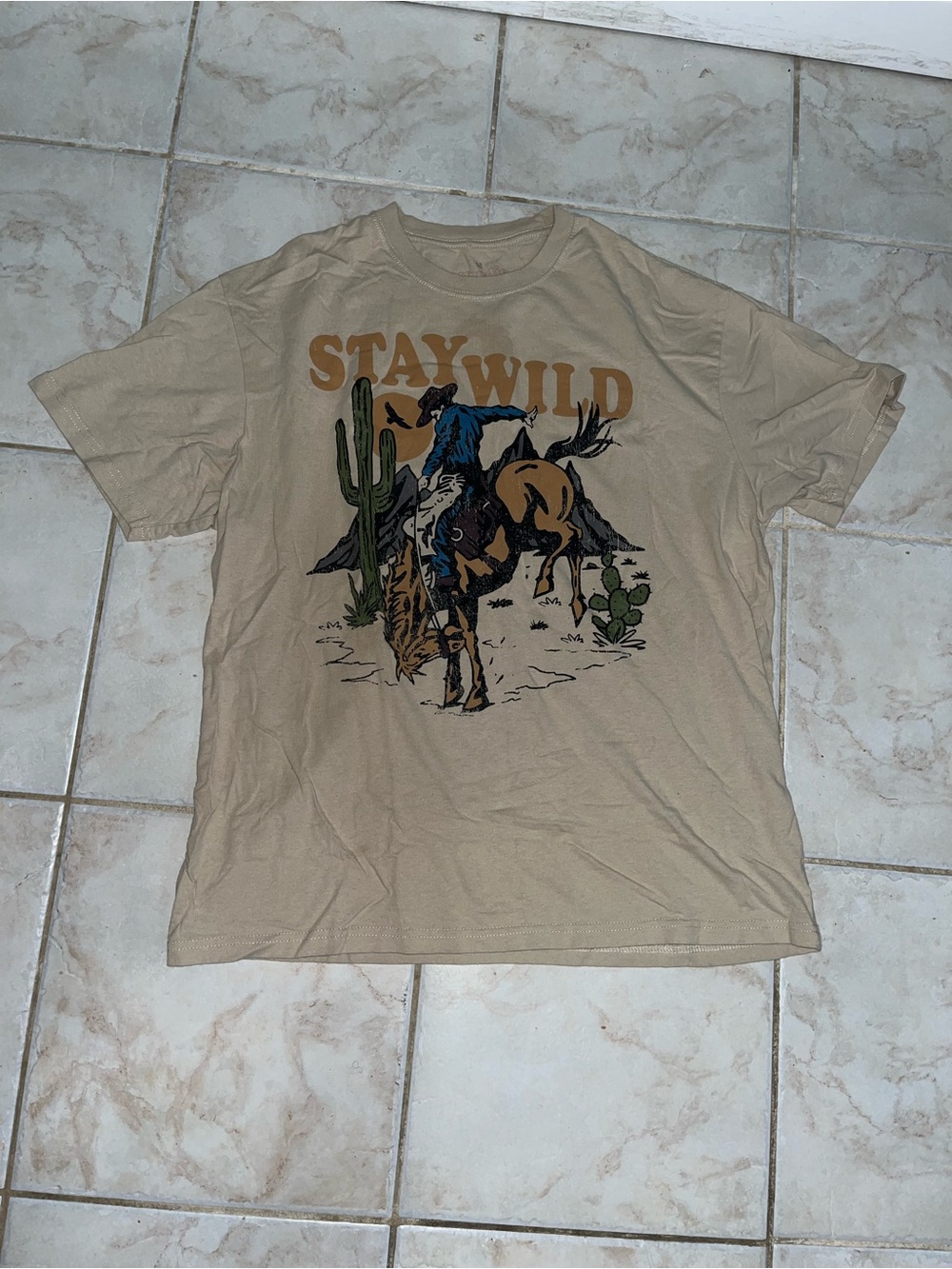 Goodie Two Sleeves Stay Wild Cowboy Graphic Tee Western Desert Beige Medium